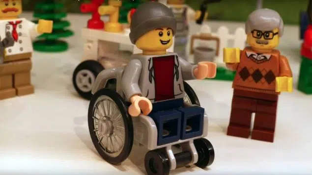 jouet fauteuil roulant motorisé